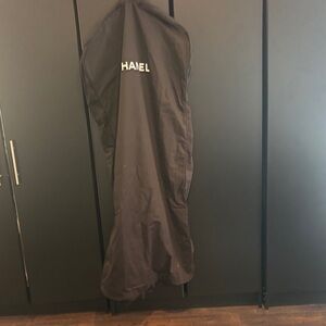 CHANEL Elegant Black Garment Cover